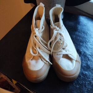 Cream high top tennis shoes